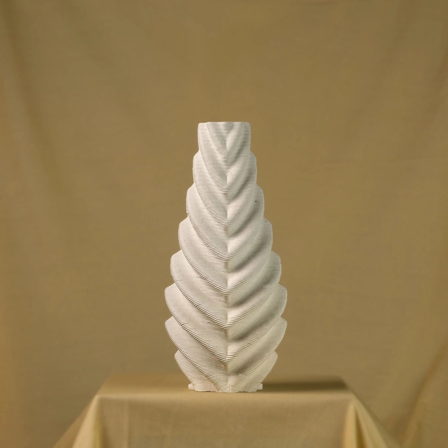 White ceramic vase in leaf design