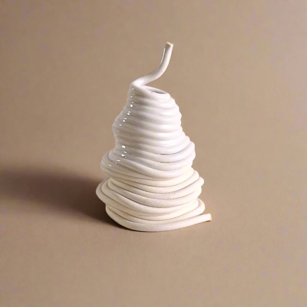 Small ceramic bud vase in white colour #color_white