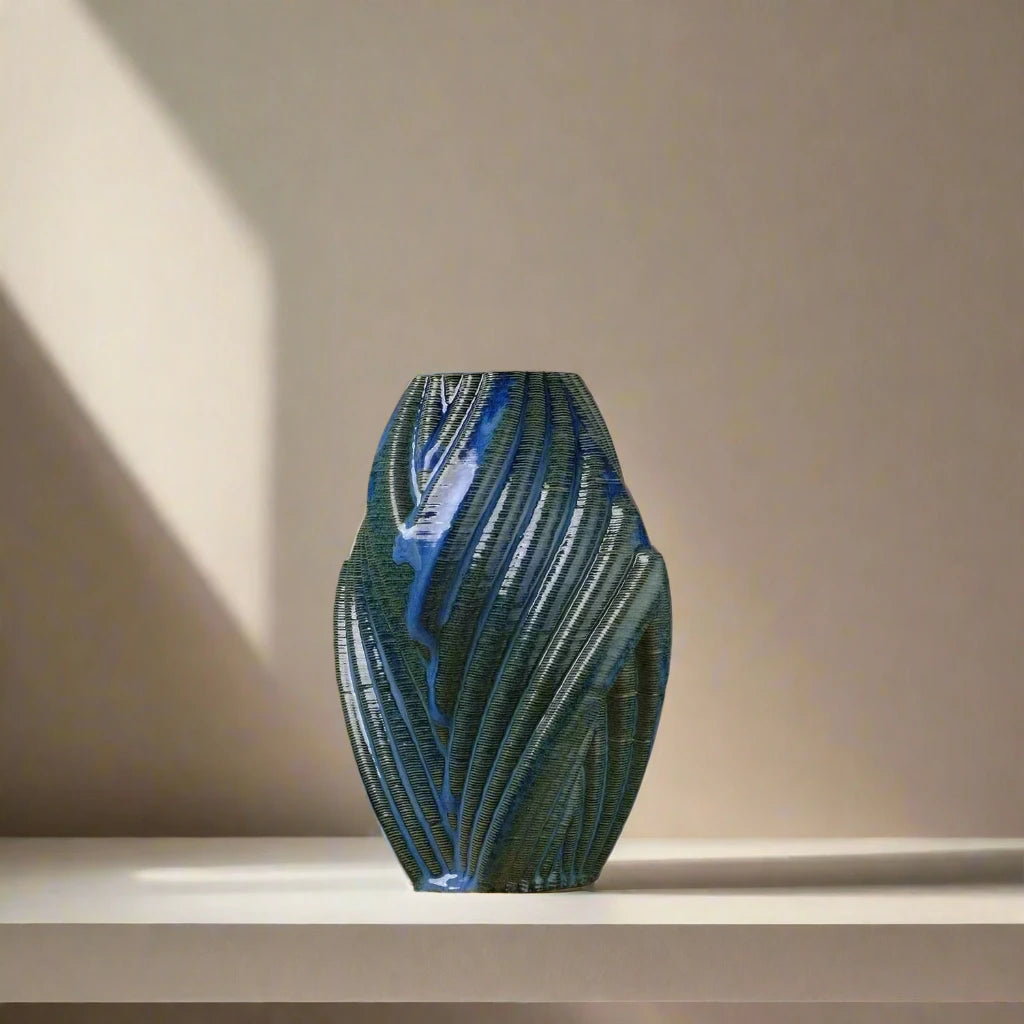 Blue ceramic vase diagonal view #color_sapphire blue