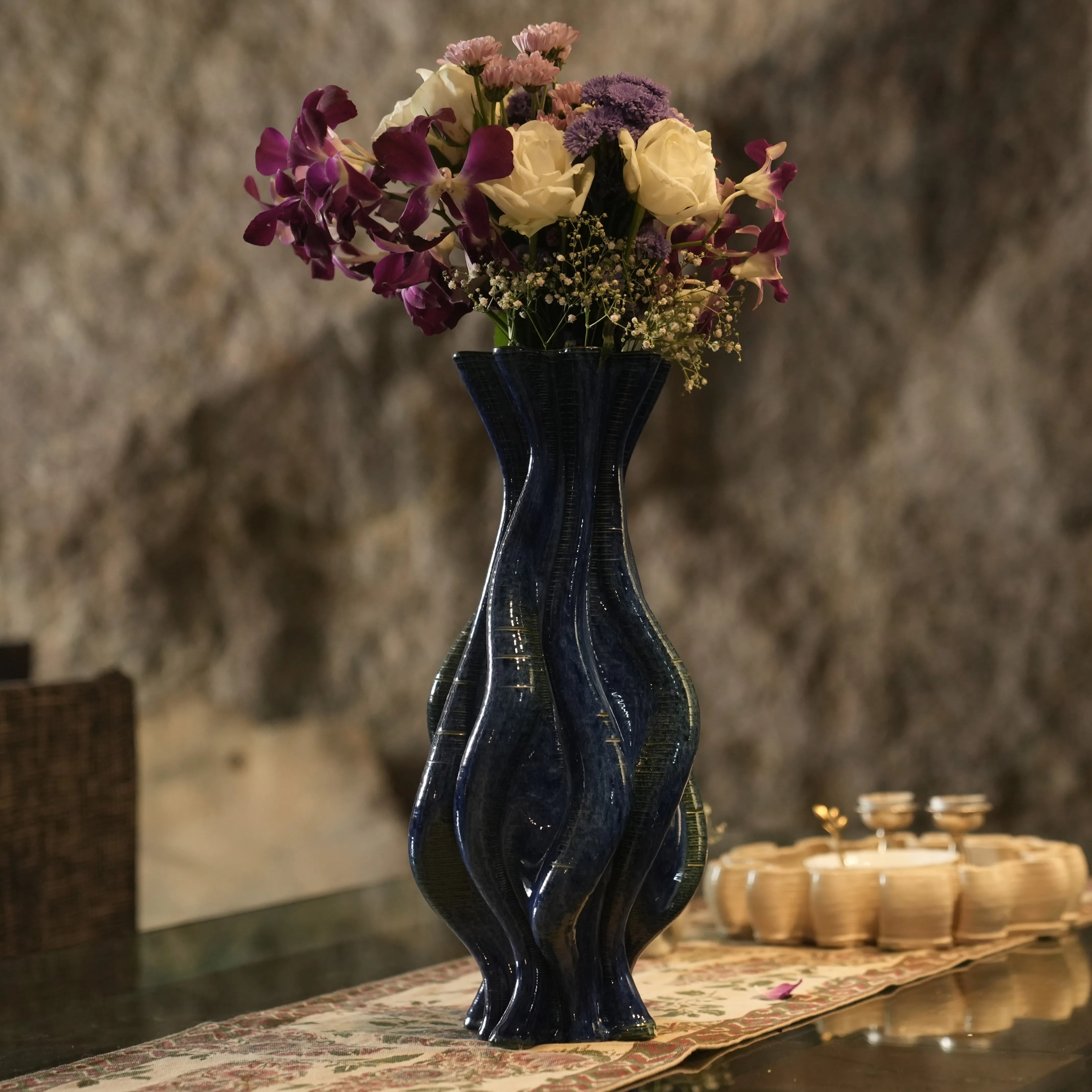 Blue ceramic vase with orchid flowers #color_sapphire blue