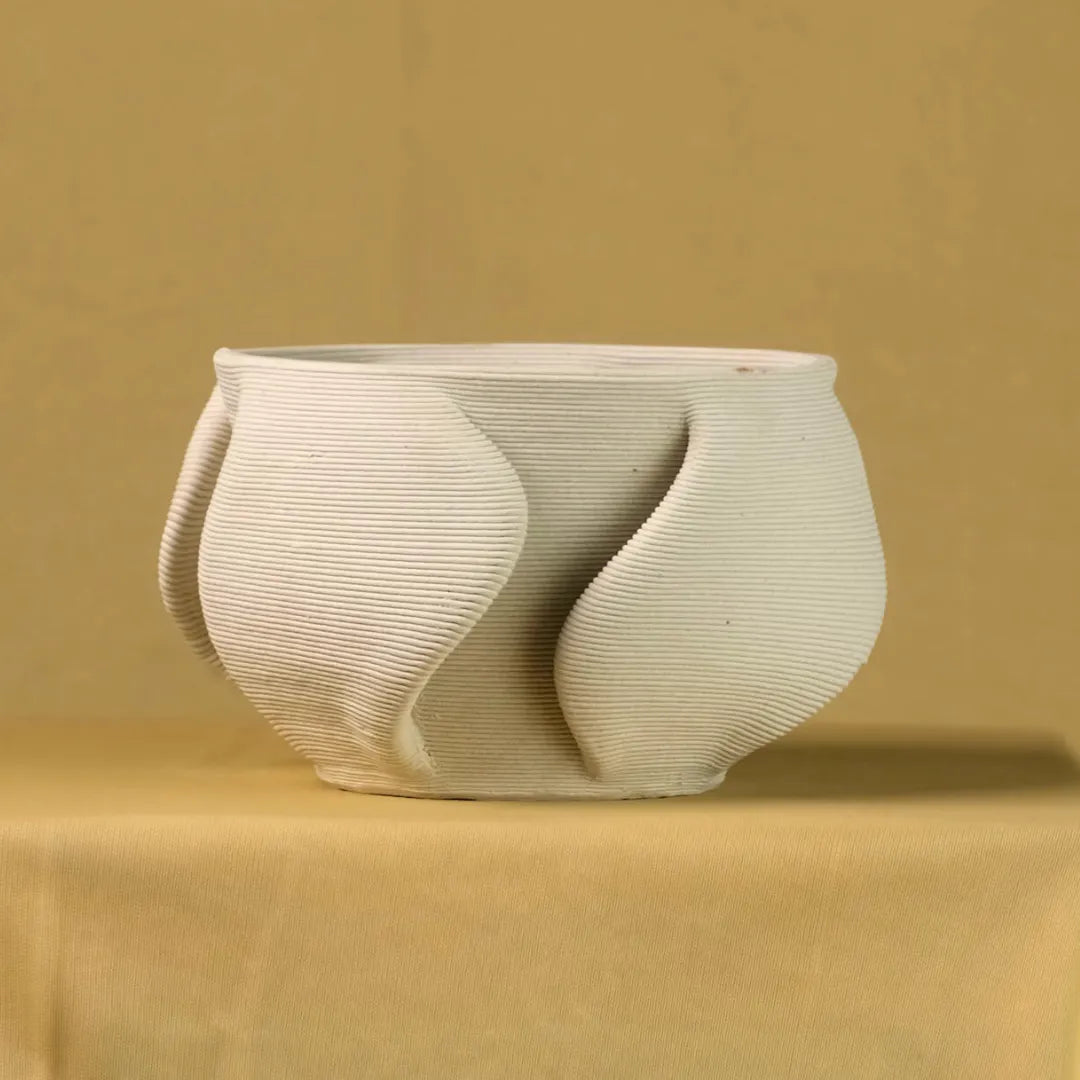 White ceramic planter in bowl shape #color_white