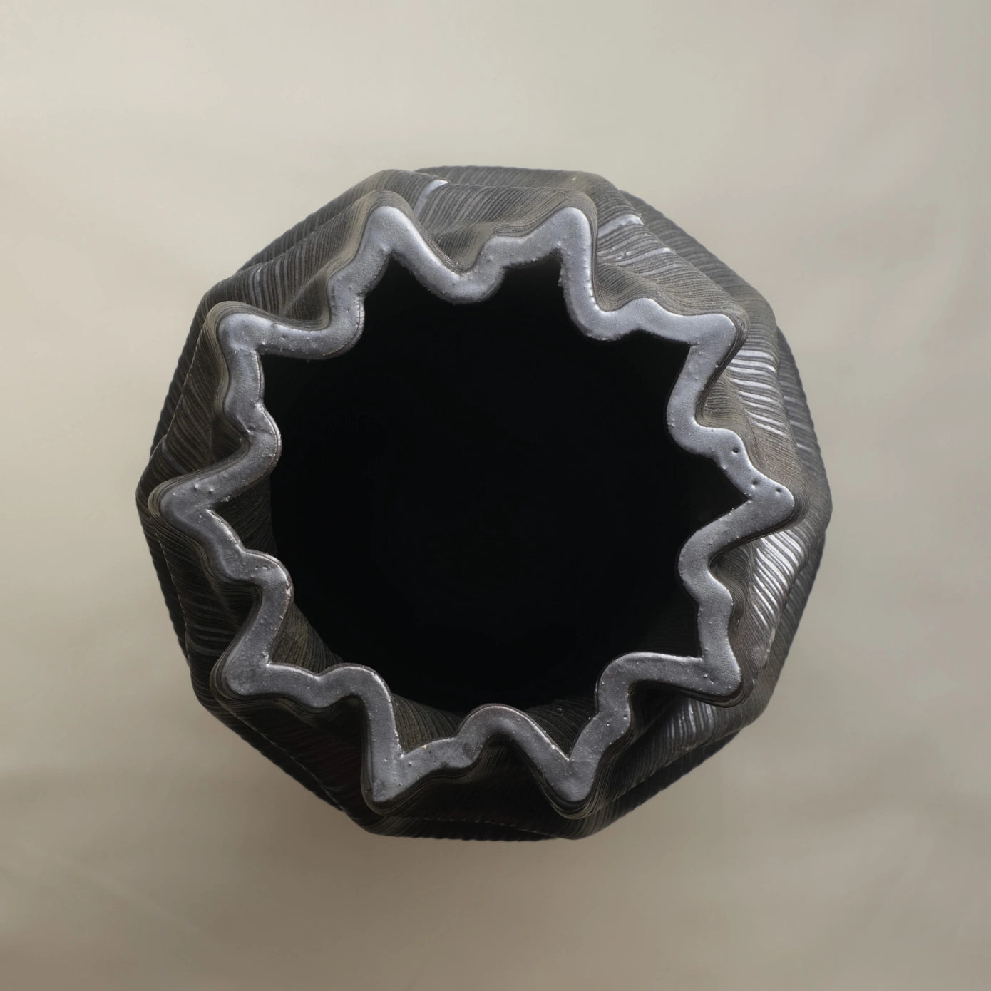 Tall black Ceramic floor vase 3D printed top view #color_black