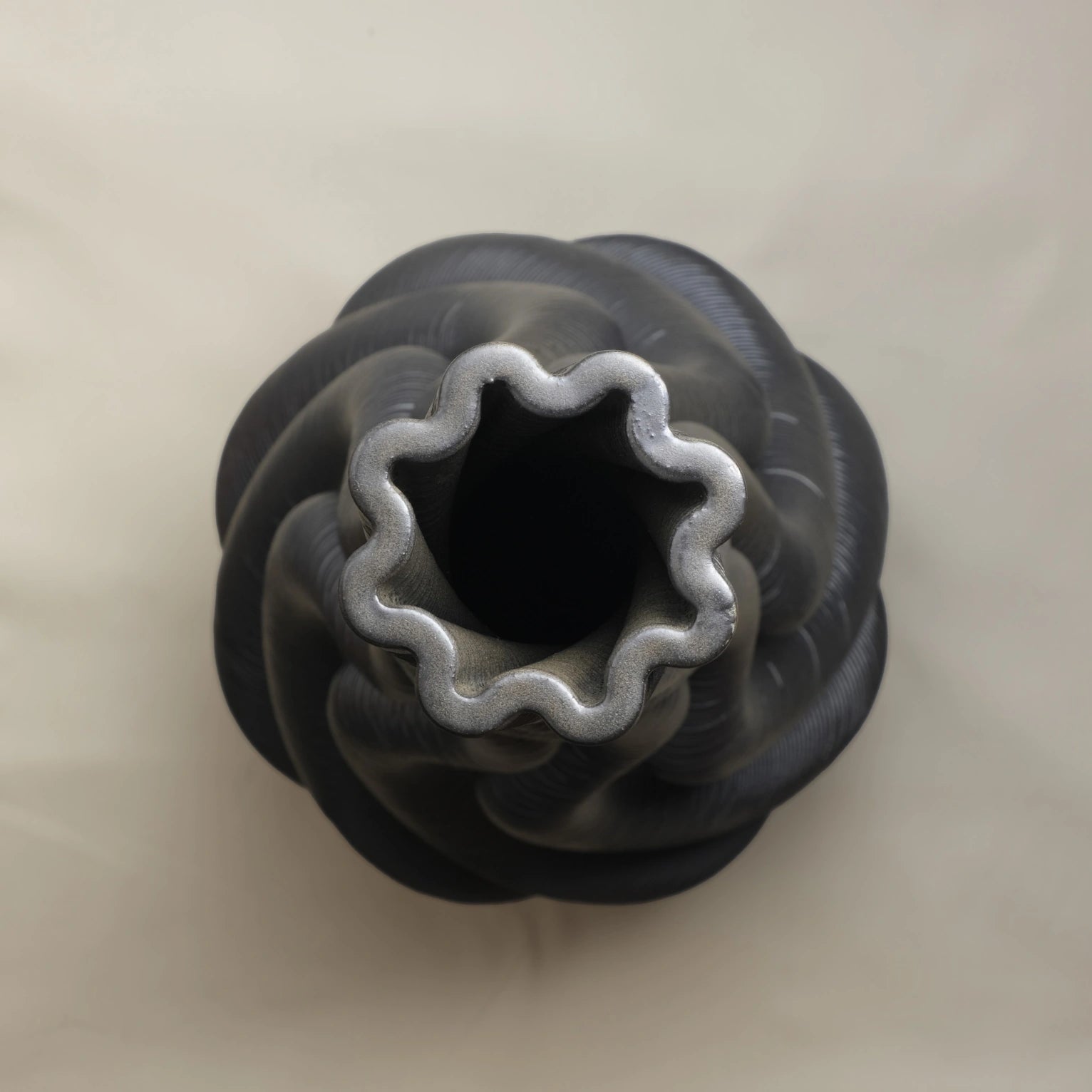 Tall black Ceramic floor vase 3D printed top view #color_black