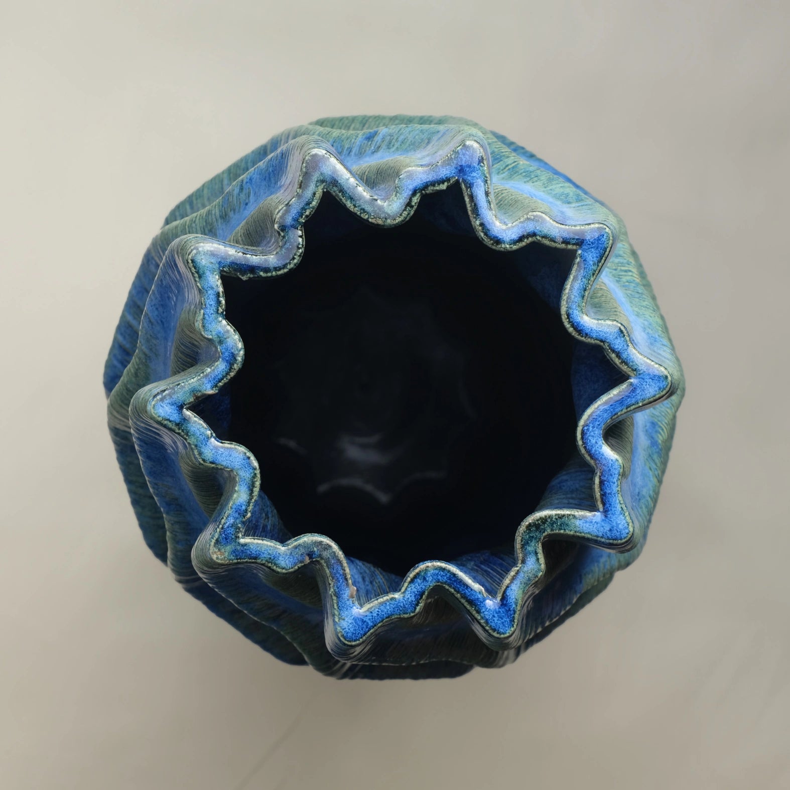 Tall blue Ceramic floor vase 3D printed top view #color_sapphire blue