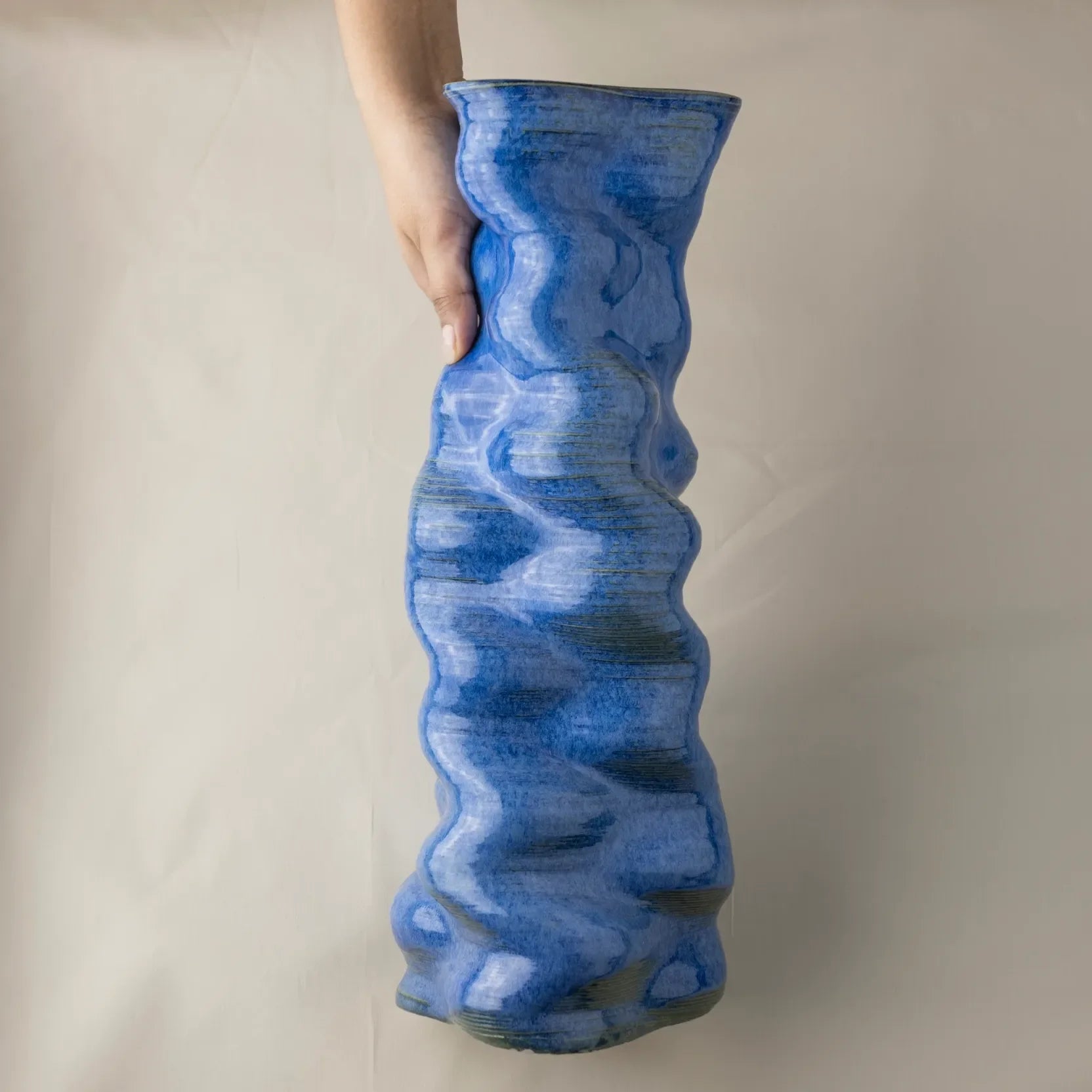 Big blue Ceramic floor vase 3D printed hand demo #color_sapphire blue