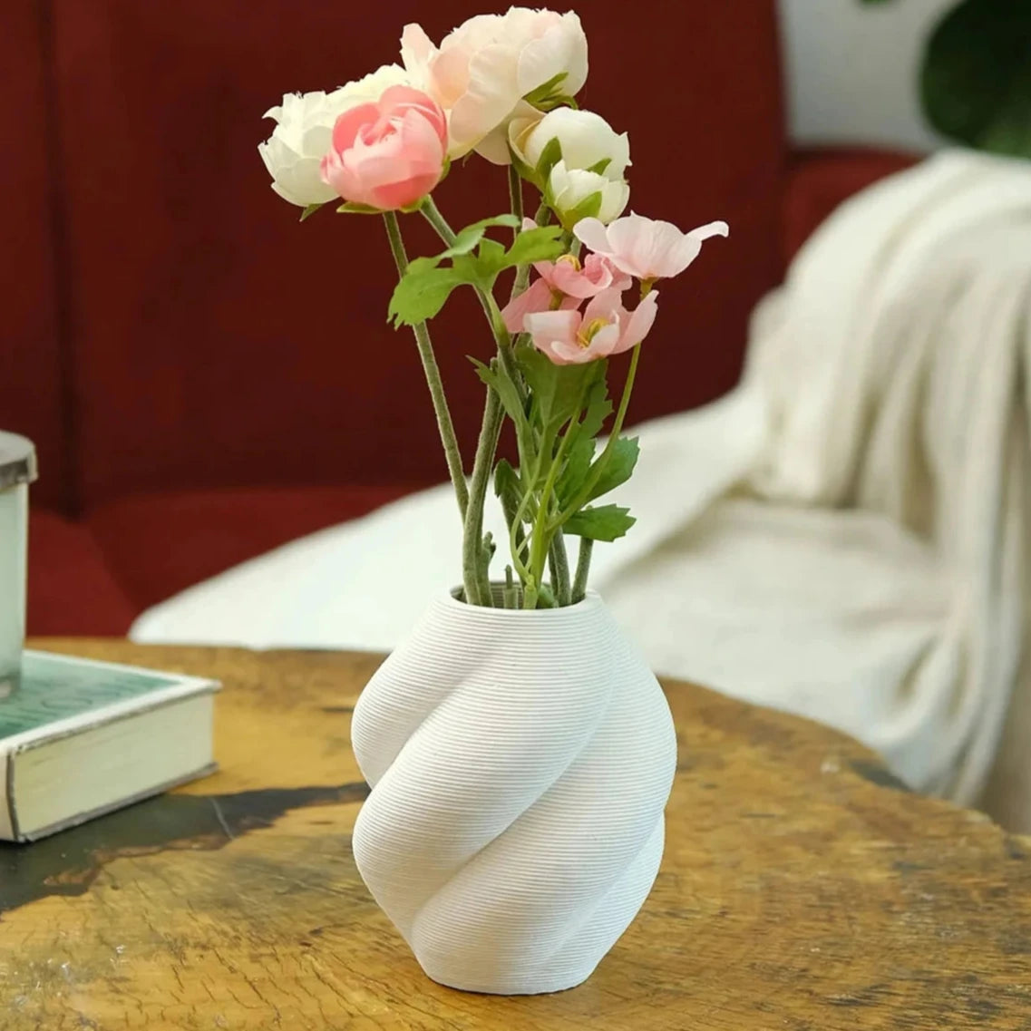 Small ceramic vase with flowers