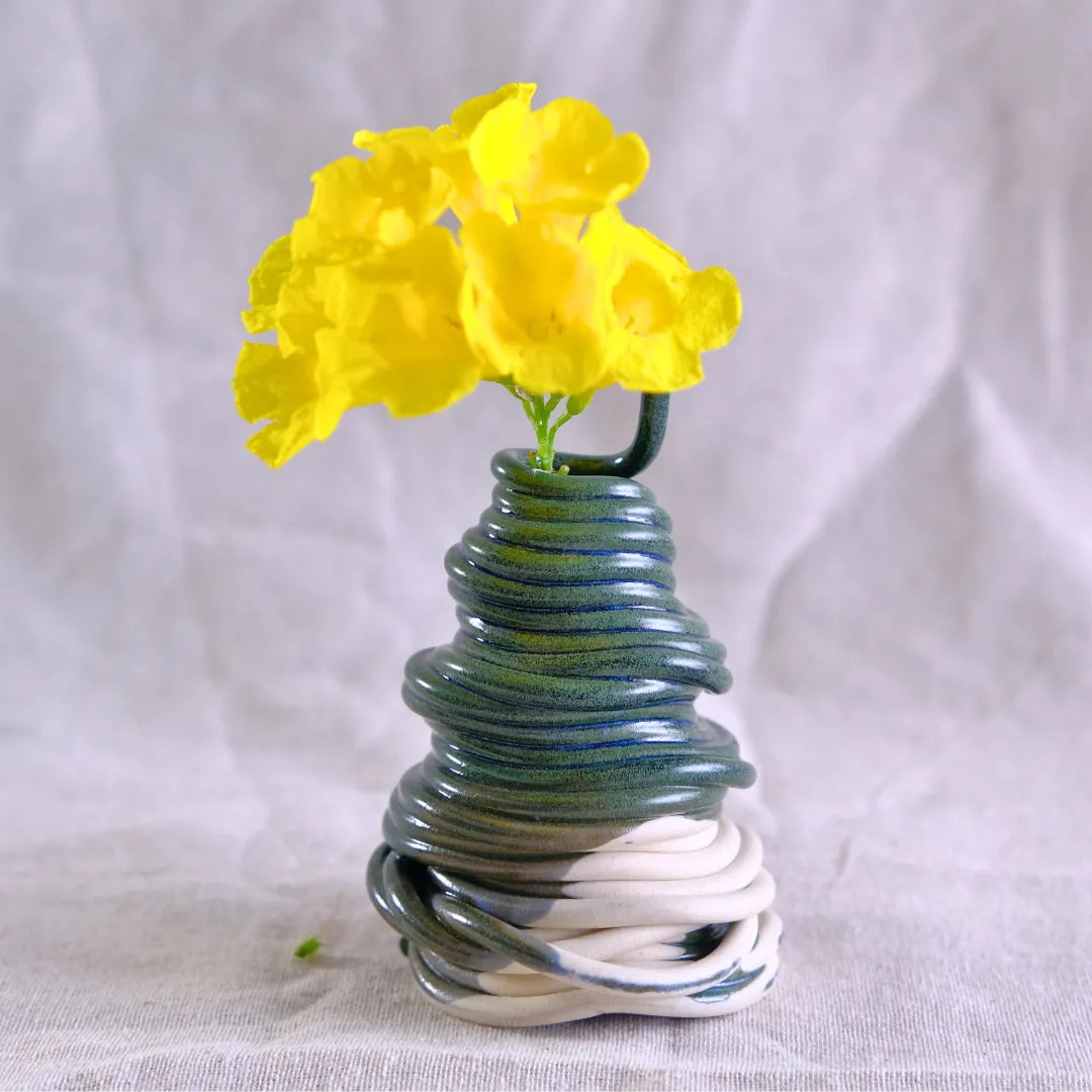 Small blue ceramic vase with yellow flowers #color_sapphire blue