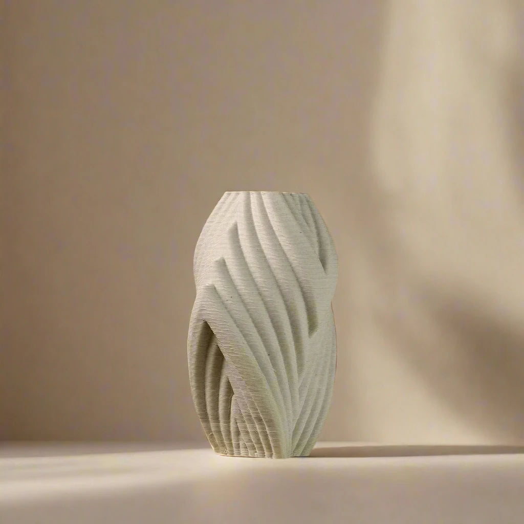 Unique white ceramic vase with detailed design #color_white